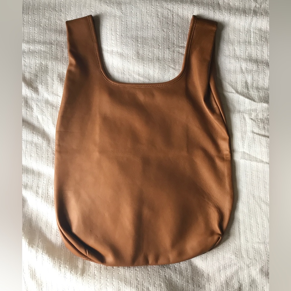 Humanoid leather bag